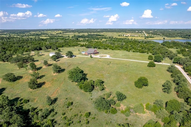 aerial view featuring a water view and a rural view