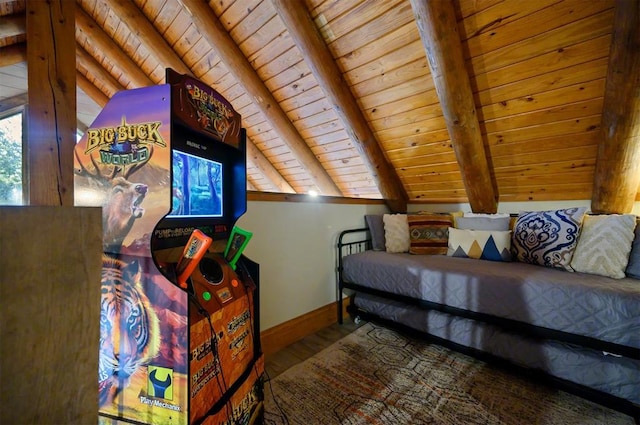 bedroom featuring vaulted ceiling with beams, hardwood / wood-style flooring, and wood ceiling