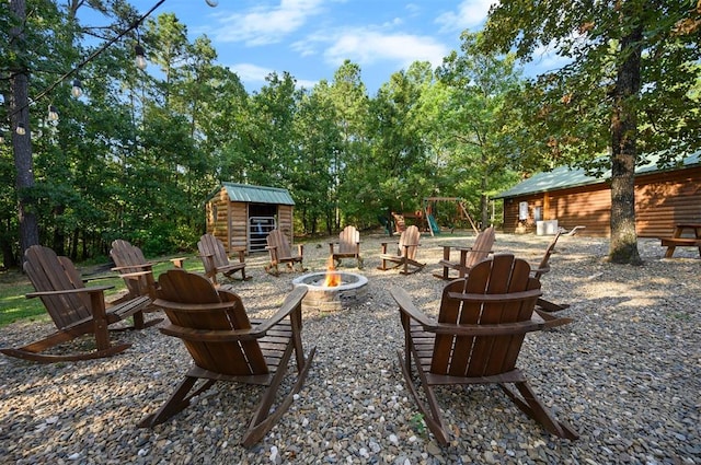 view of patio featuring an outdoor fire pit