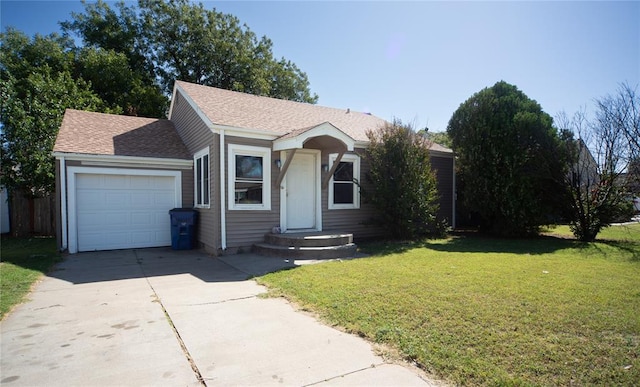 view of front facade featuring a front yard and a garage