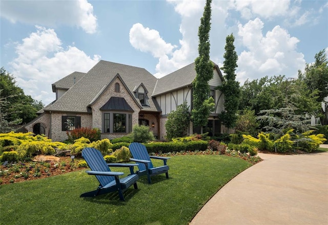 view of front of home with a front lawn