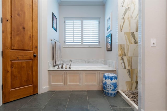 bathroom with tile patterned floors, independent shower and bath, and ornamental molding