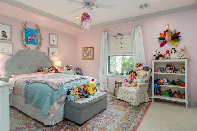 bedroom with carpet flooring, ceiling fan, and crown molding