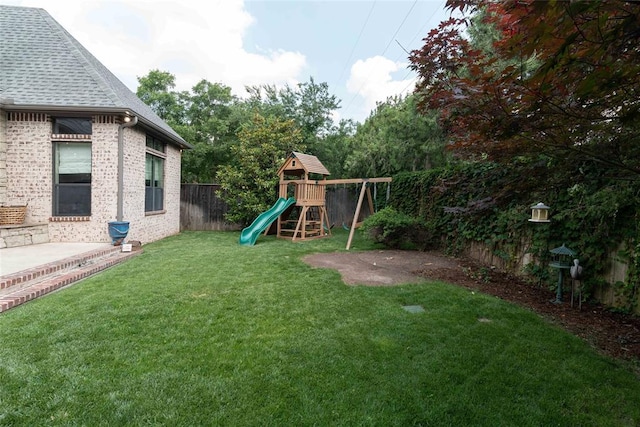 view of yard featuring a playground