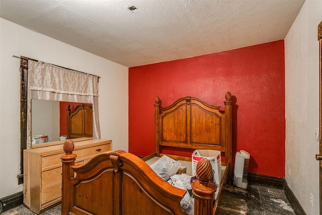 bedroom featuring a textured ceiling