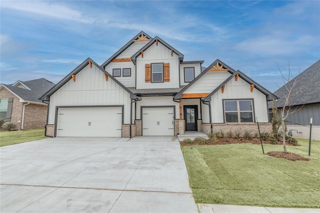 craftsman house with a garage and a front yard