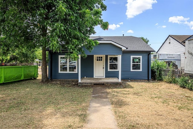 bungalow with a front yard