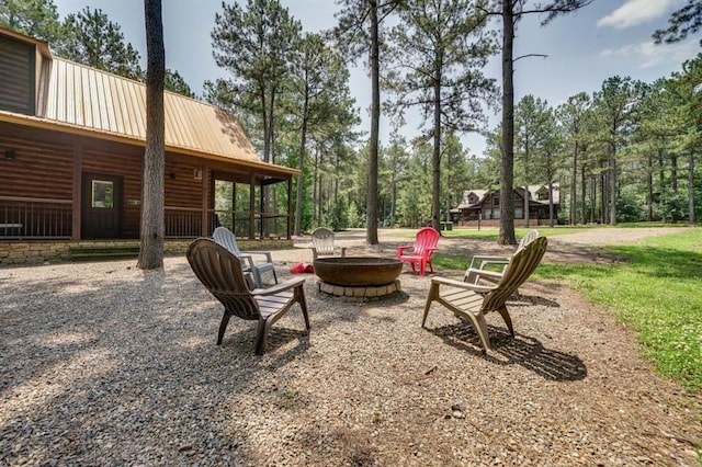 view of patio with an outdoor fire pit