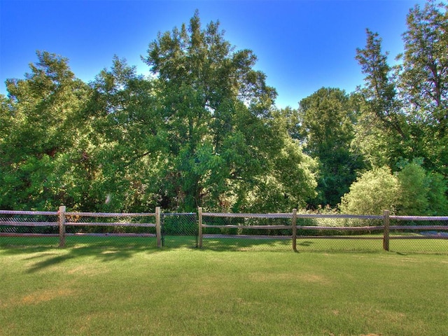 surrounding community featuring a lawn