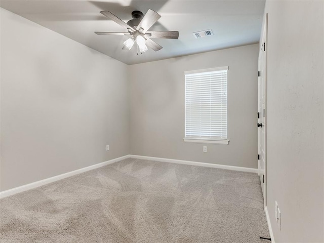 unfurnished room featuring carpet flooring and ceiling fan