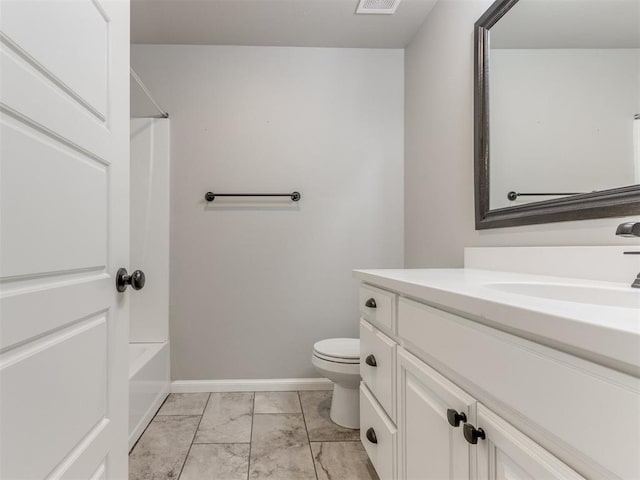 full bathroom with bathing tub / shower combination, vanity, and toilet