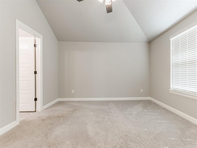 bonus room featuring ceiling fan, light colored carpet, and lofted ceiling