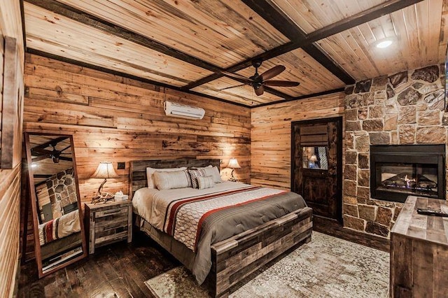 bedroom with beam ceiling, ceiling fan, dark wood-type flooring, and wood ceiling