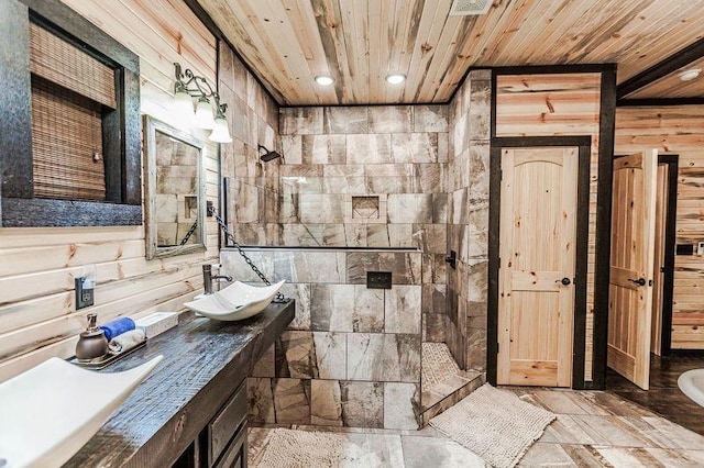 21 Mayflower Cir, Broken Bow, OK 74728 - bathroom featuring wooden walls, wooden ceiling, walk in shower, vanity, and recessed lighting