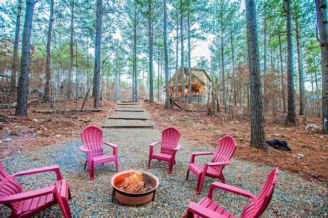 view of patio / terrace with a fire pit