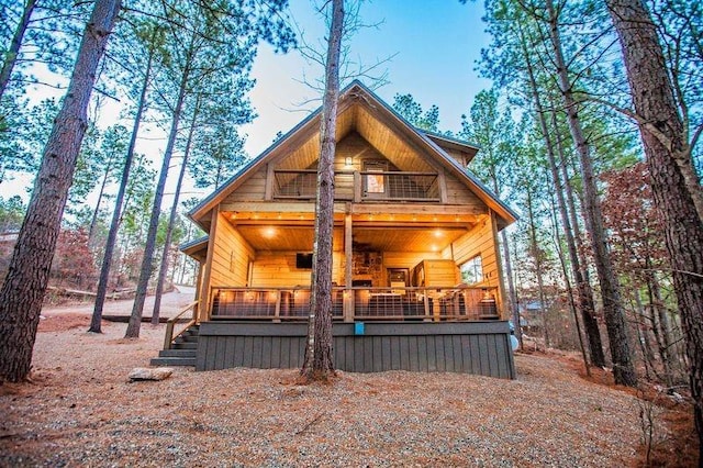 21 Mayflower Cir, Broken Bow, OK 74728 - view of front of property with a balcony