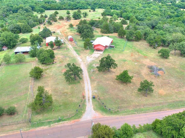 birds eye view of property featuring a rural view