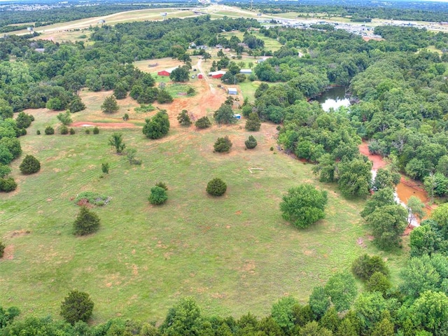 aerial view with a water view and a rural view