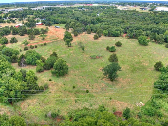 birds eye view of property with a rural view