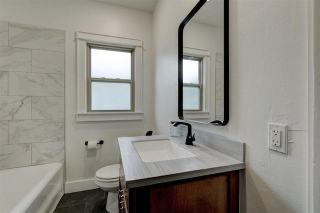 full bathroom with vanity, toilet, and tiled shower / bath