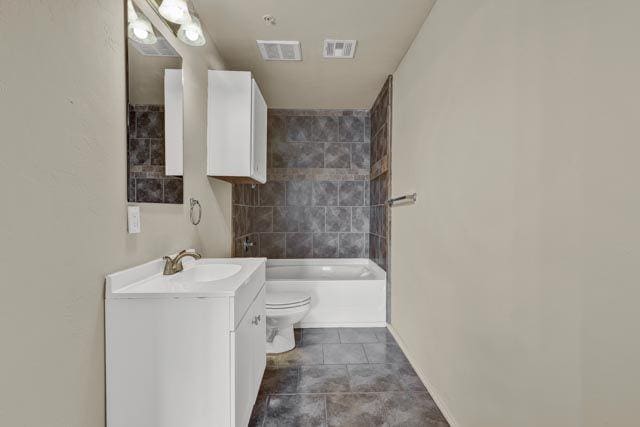 full bathroom with tile patterned flooring, vanity, toilet, and shower / tub combination