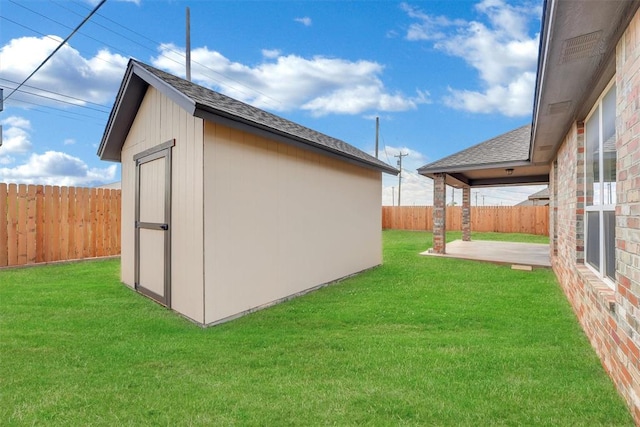 exterior space featuring a patio area and a shed