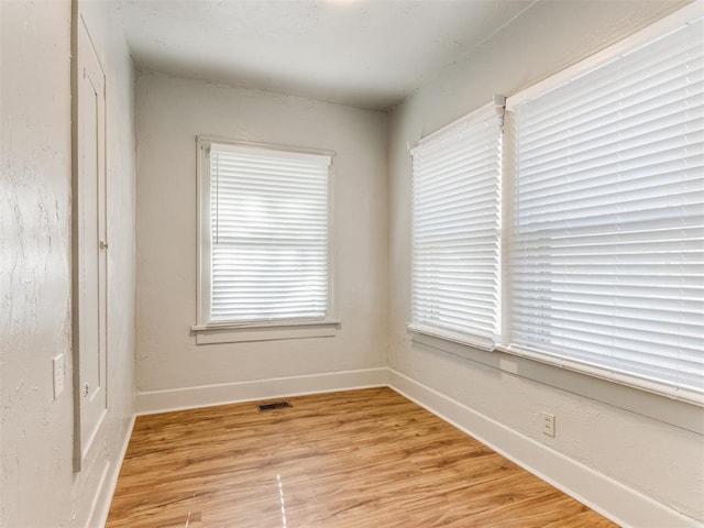 empty room featuring light wood-type flooring