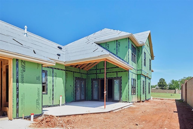 rear view of house featuring a patio