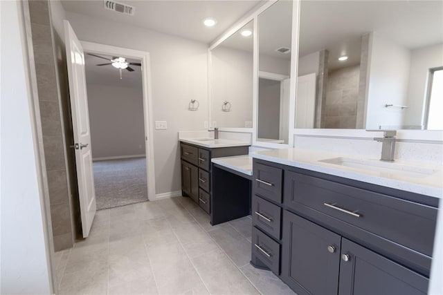 bathroom featuring ceiling fan, vanity, and tile patterned flooring