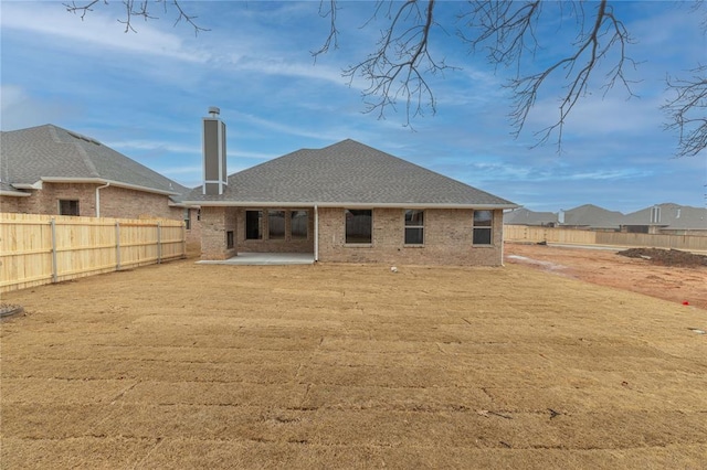 back of house featuring a patio area