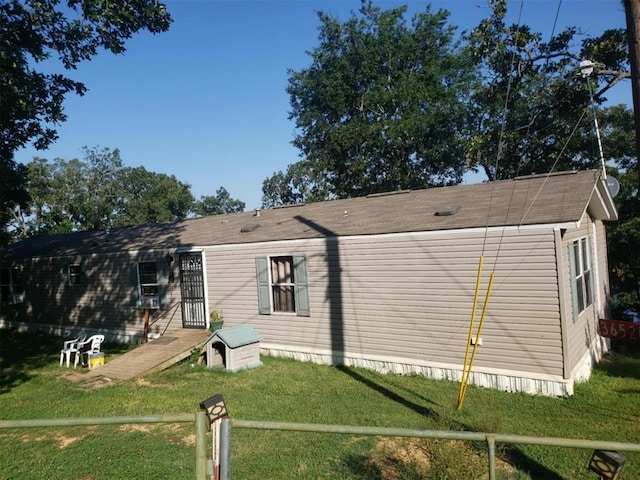 exterior space featuring a front lawn