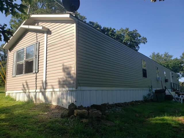 view of property exterior featuring a yard