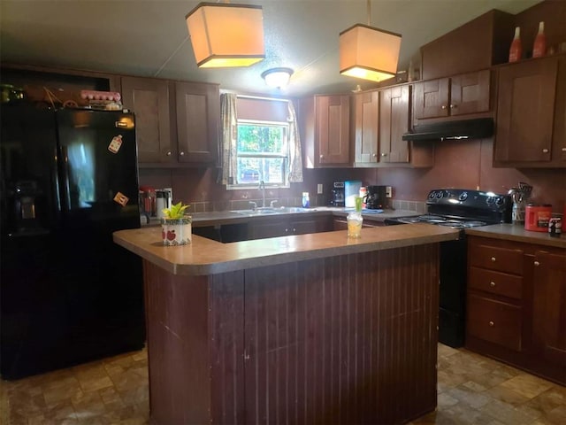 kitchen with sink, a kitchen island, black appliances, and lofted ceiling