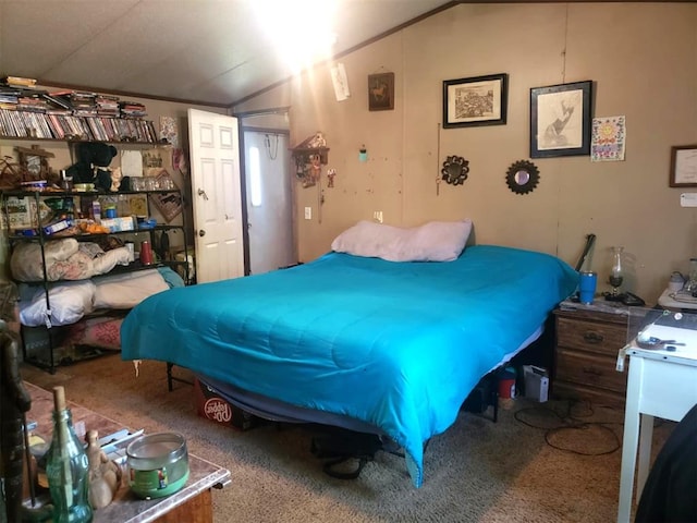 carpeted bedroom featuring vaulted ceiling