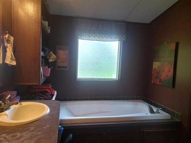 bathroom featuring a bathing tub and vanity