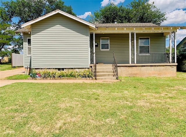 view of front of home with a porch and a front yard