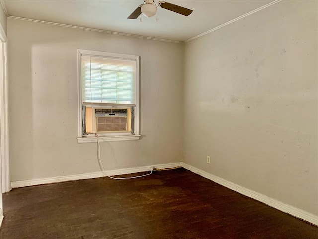 empty room featuring dark hardwood / wood-style flooring, cooling unit, crown molding, and ceiling fan