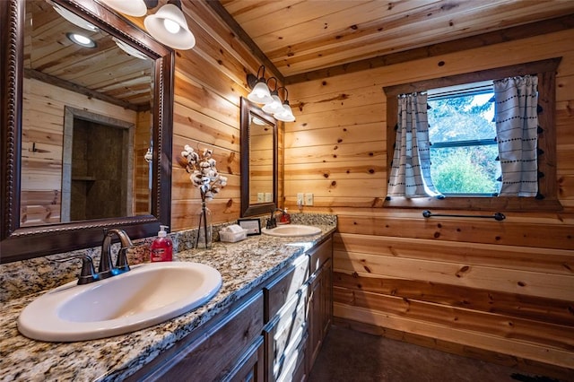 bathroom featuring vanity, wood ceiling, and wood walls