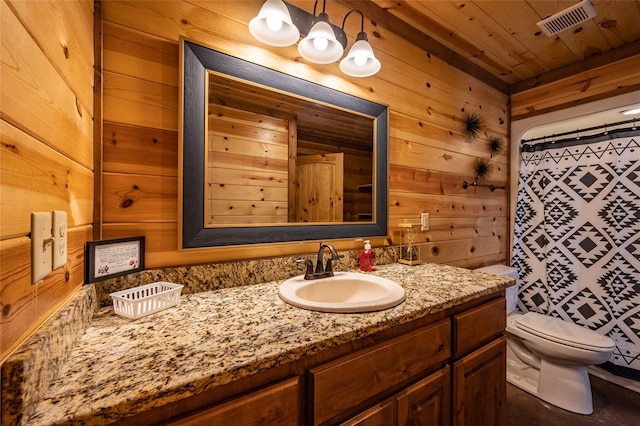 bathroom with toilet, wooden walls, vanity, wood ceiling, and a shower with shower curtain