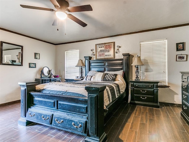 bedroom featuring dark hardwood / wood-style flooring, ceiling fan, and ornamental molding