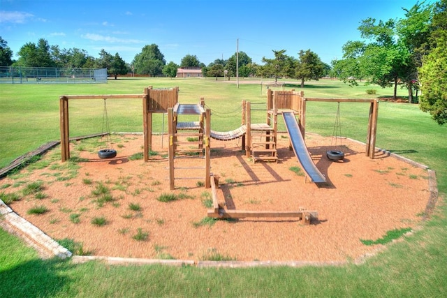 view of playground featuring a yard