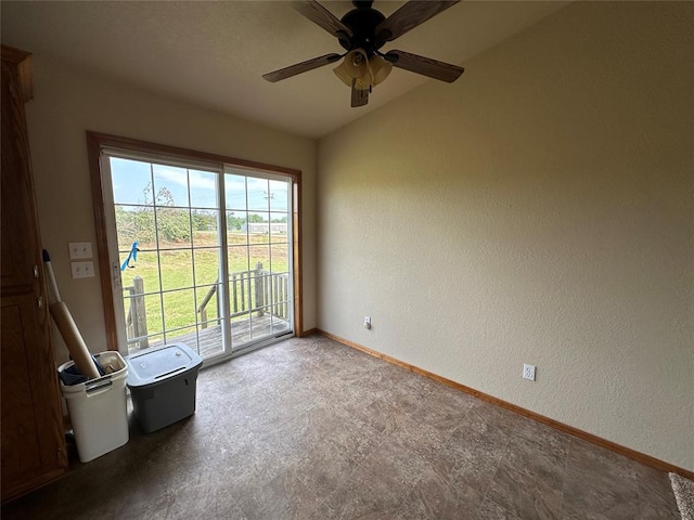 unfurnished room featuring ceiling fan and lofted ceiling