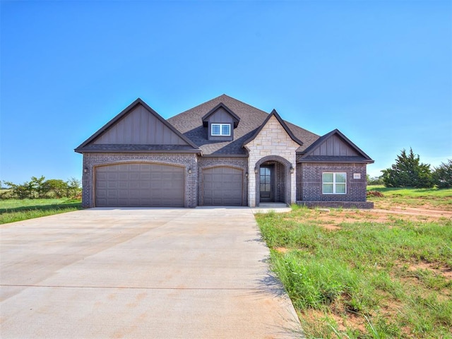 view of front of home with a garage