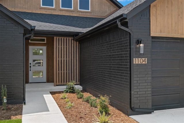 entrance to property with a garage