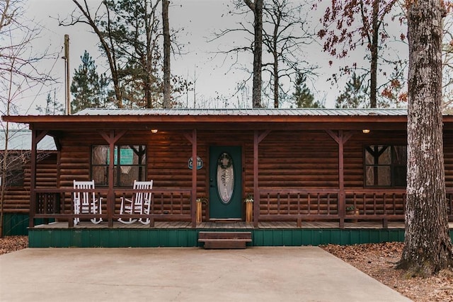 log home with a porch