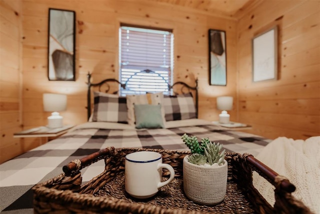 bedroom with wood walls