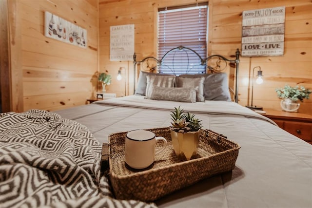 bedroom with wooden walls