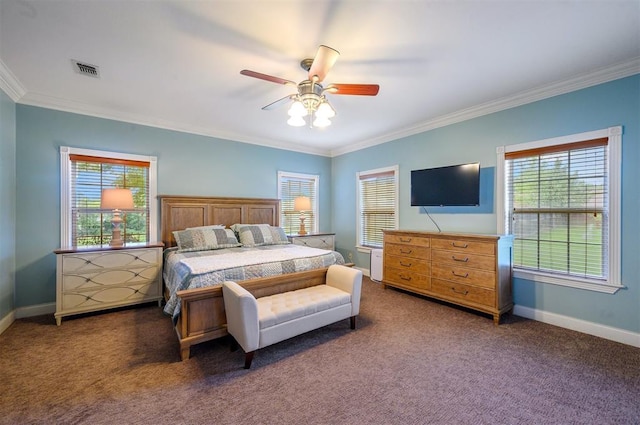 carpeted bedroom featuring ceiling fan and ornamental molding