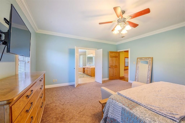 carpeted bedroom featuring ensuite bath, ceiling fan, and crown molding