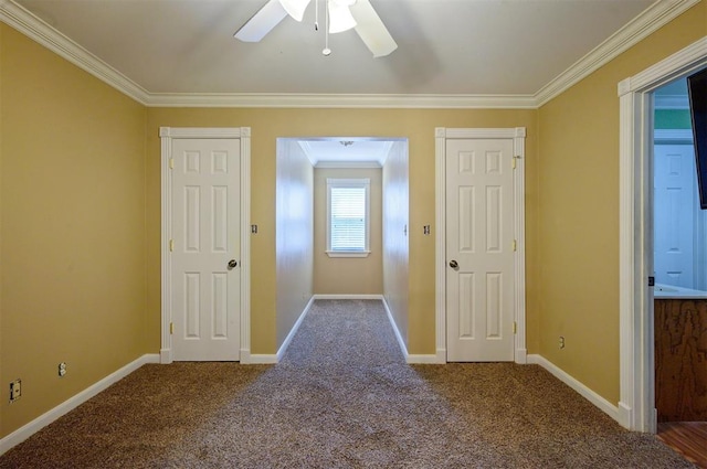 interior space featuring crown molding and carpet floors